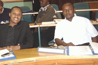 Costantine with friend and mentor, Innocent Mushi, at a seminar at Wits Business School in South Africa